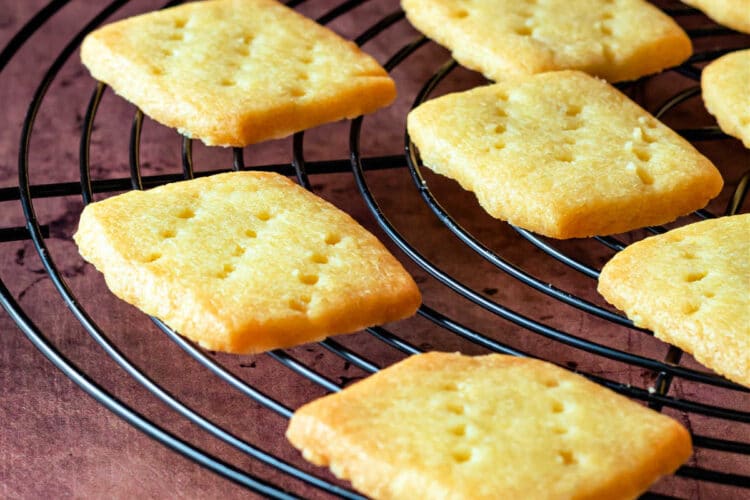 A wire rack with rectangular shortbread cooling.