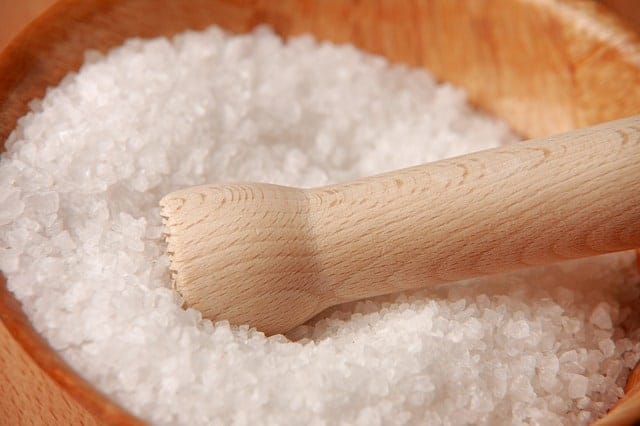 close up of salt in a wooden bowl