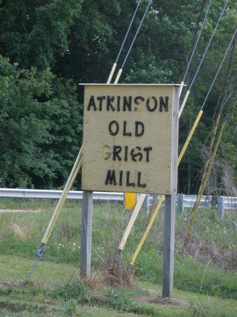 sign for Atkinson's Mill reading "Atkinson Old Grist Mill."