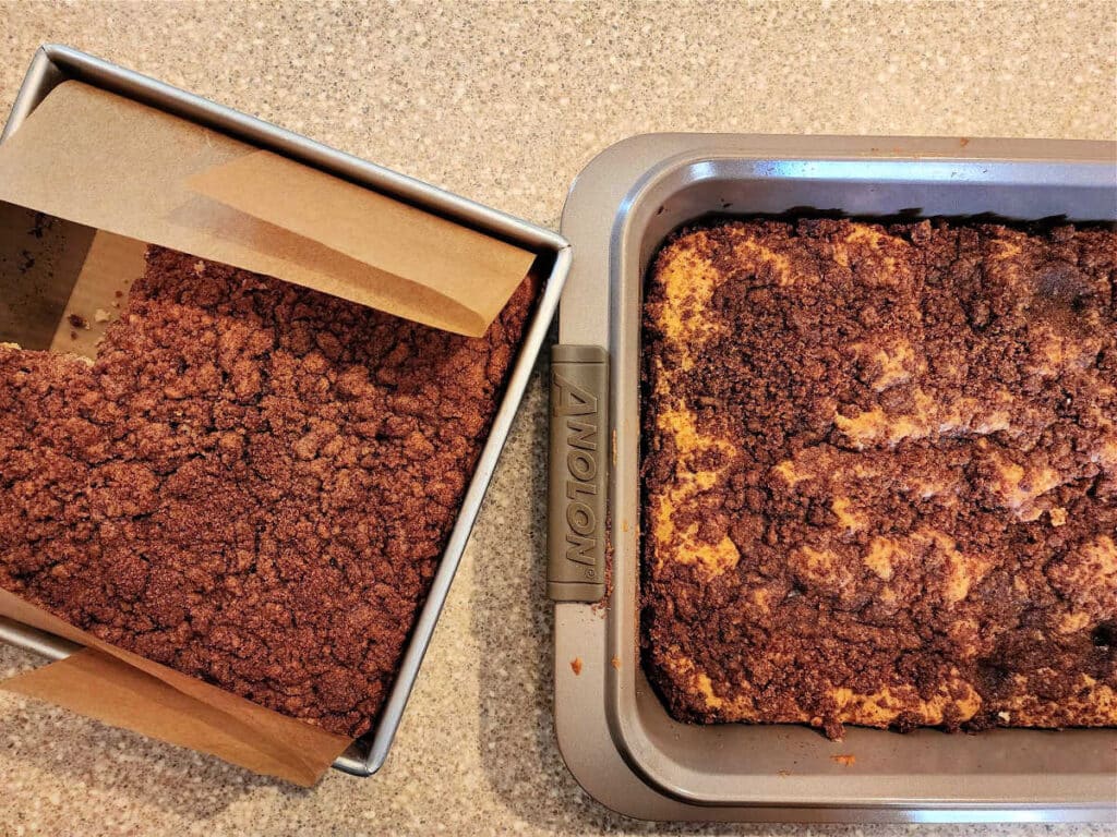 An overhead shot of two cinnamon coffee cakes in their pans.