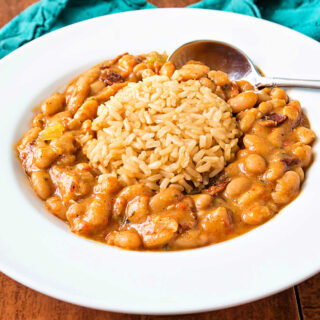 The best great northern beans in a bowl with brown rice.