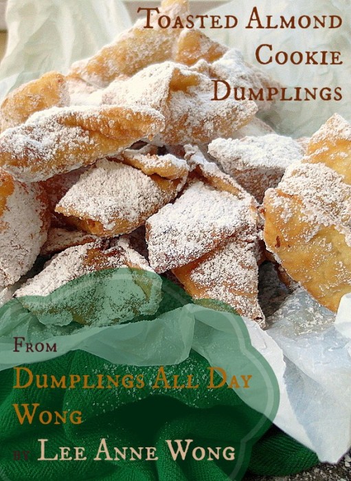 Cookbook cover Text reads "Toasted Almond Cookie Dumplings from Dumplings All Day Wong by Lee Anne Wong". Picture of sugar sprinkled dumplings in a container lined with white paper.