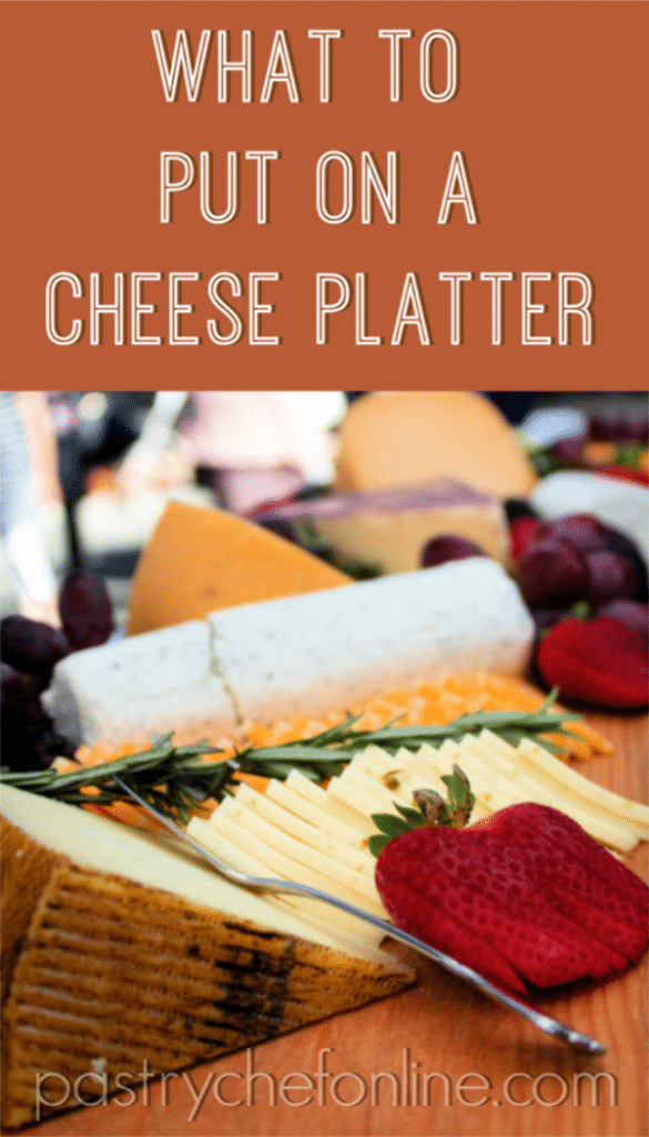 cheese and fruit on a board. text reads what to put on a cheese platter