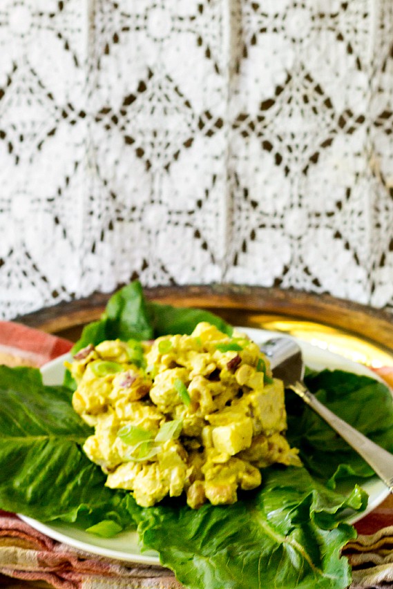 Coronation chicken salad on a bed of lettuce.