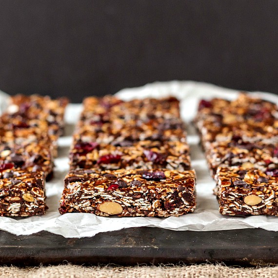 Sliced vegan granola bars on parchment.