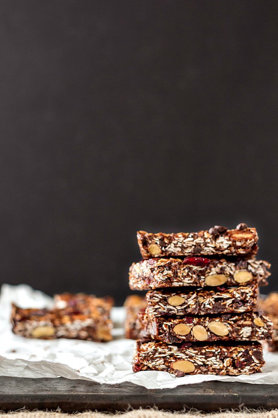 A stack of no-bake vegan chocolate chocolate chip granola bars.