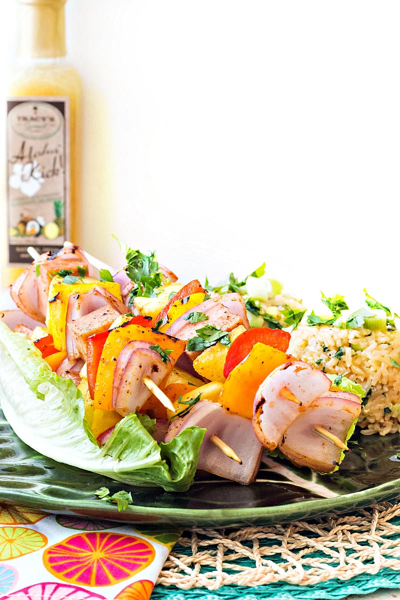 A platter of Hawaiian Pineapple Ham Skewers with Sweet and Hot Pineapple Rice.