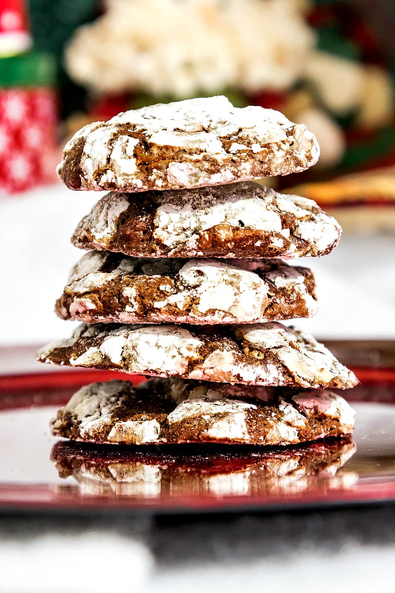 A tall stack of chocolate peppermint crinkle cookies.