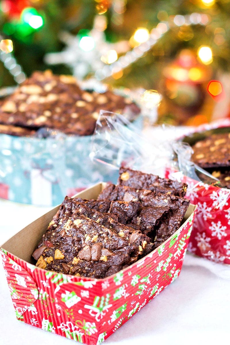 Christmas cardboard loaf pans filled with squares of crispy peppermint brownie brittle.