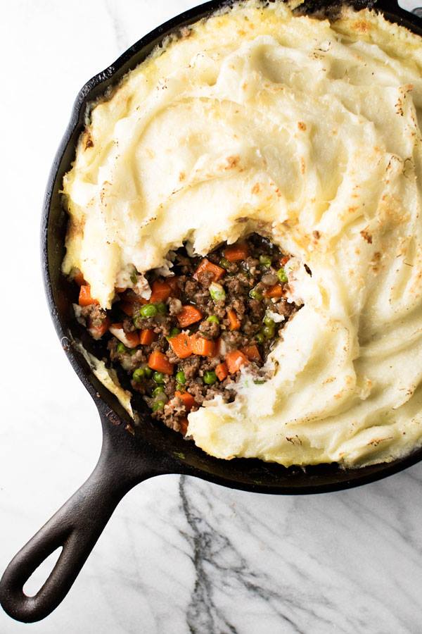 Shepherd's Pie from Girl Gone Gourmet with some mashed potatoes removed to show the beef and vegetable filling.