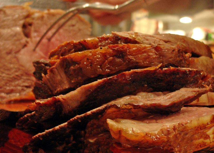 Simply Perfect Prime Rib from Life of a Ginger sliced with a serving fork.