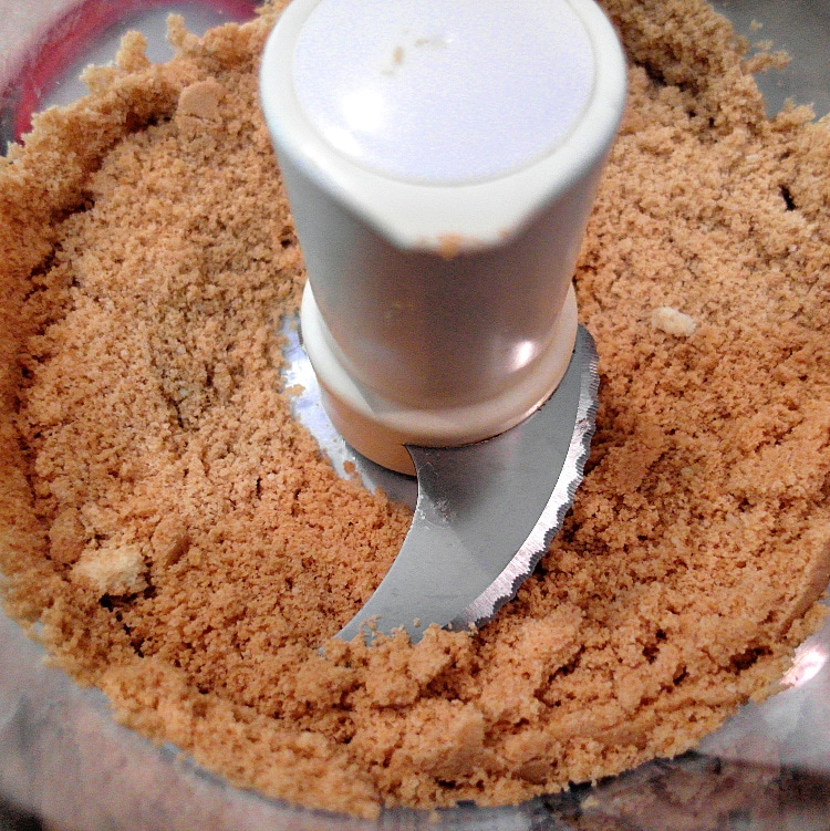 Cookie crumbs in a food processor.