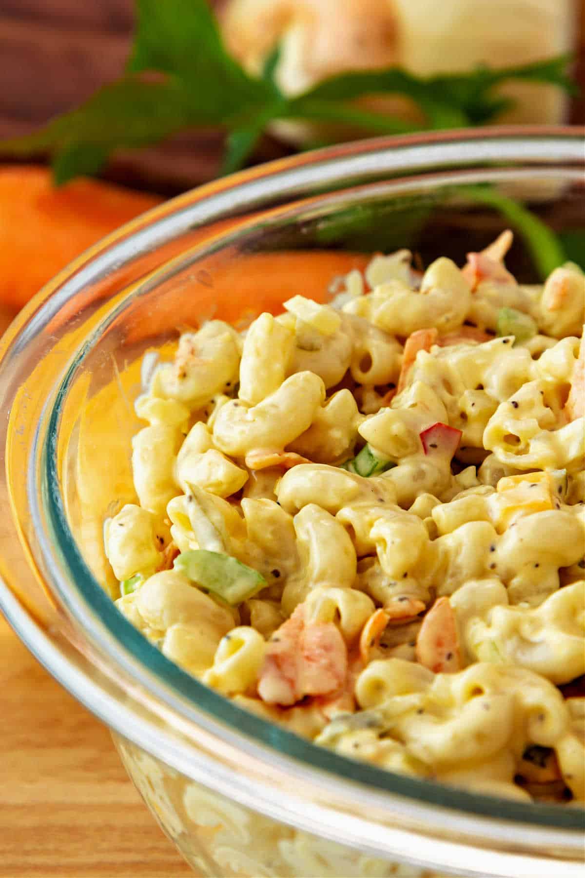 A gladd bowl of macaroni salad.