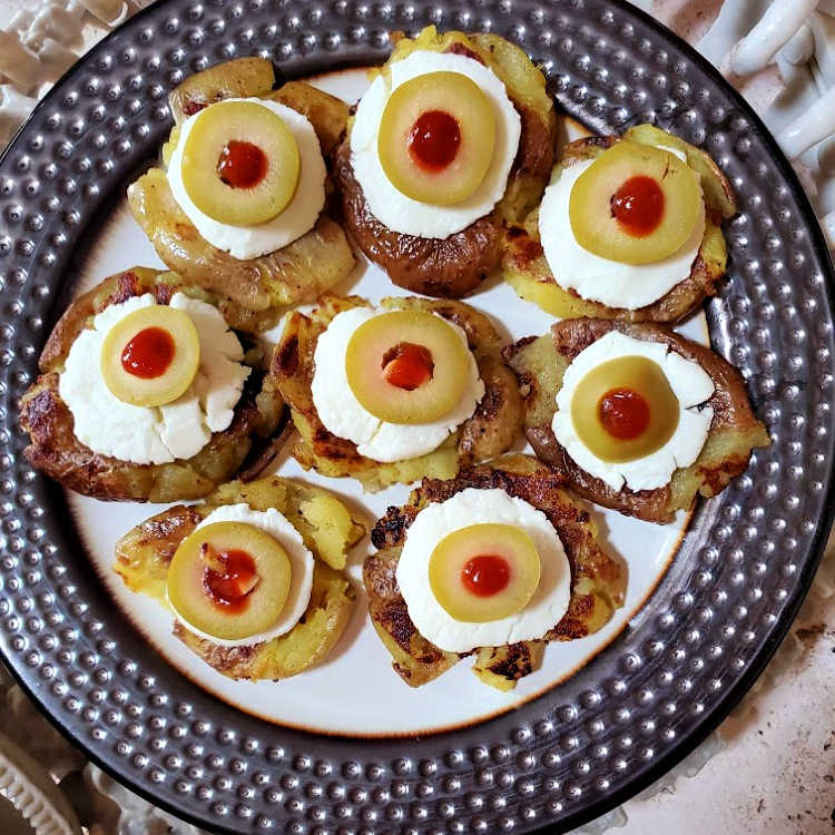 A platter of Halloween potato eyes ready for serving.