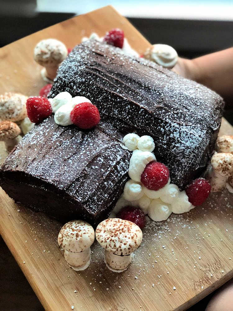 Reader image of chocolate yule log cake, including meringue mushrooms.