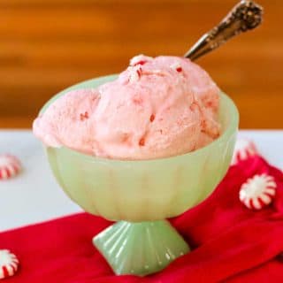 a green bowl of homemade peppermint ice cream
