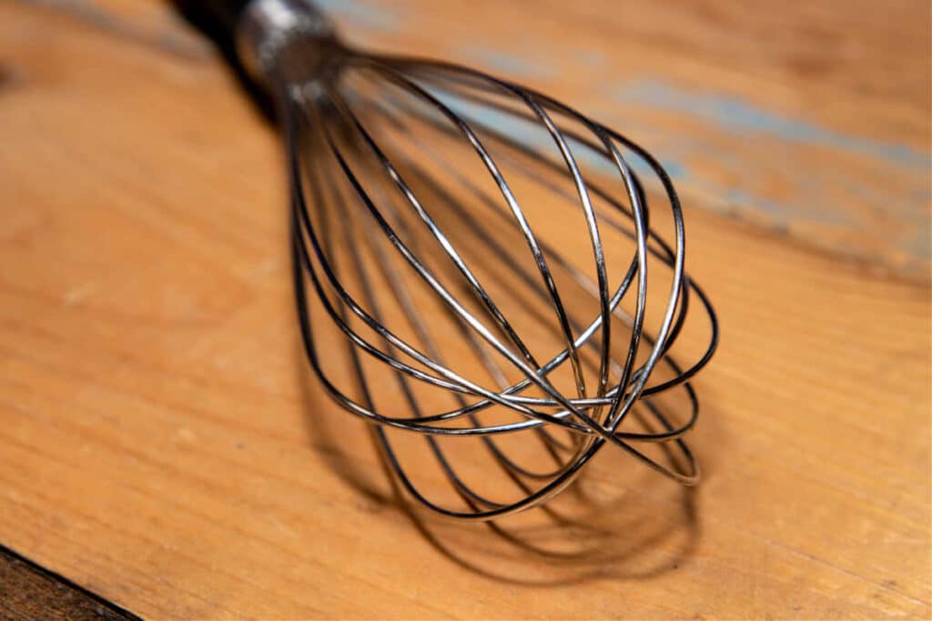 Close up view of the wires on a balloon whisk.