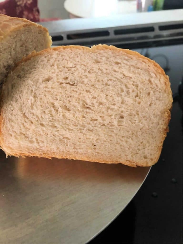 Close up of grits bread, showing the tender crumb.