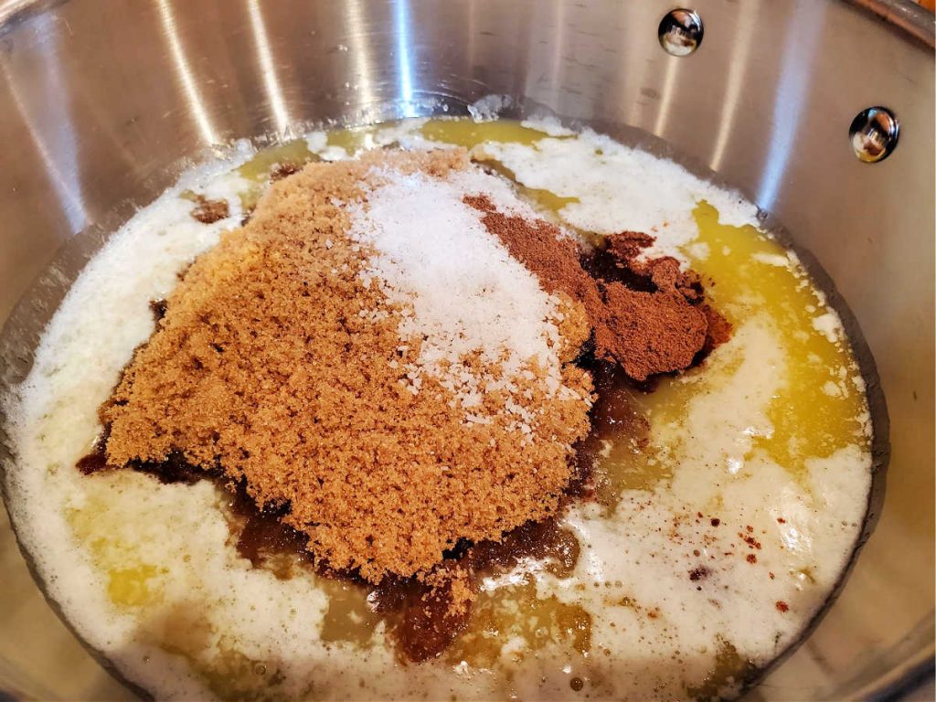 Melted butter, brown sugar, salt, and pumpkin spice in a saucepan.