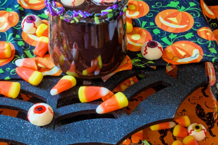 2 jars of easy chocolate pudding decorated for Halloween