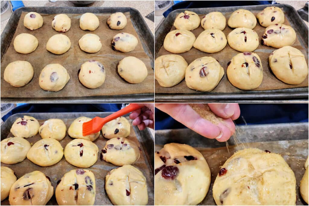 A collage of 4 images showing how to finish hot cross buns before baking. 1)The buns on parchment before rising. 2)The same buns, which have risen considerable and are much larger than at the beginning of the rise. 3)Brushing eggwash on the buns with a silicone pastry brush. 4)A close up of fingers sprinkling coarse sugar on top of the buns before baking.