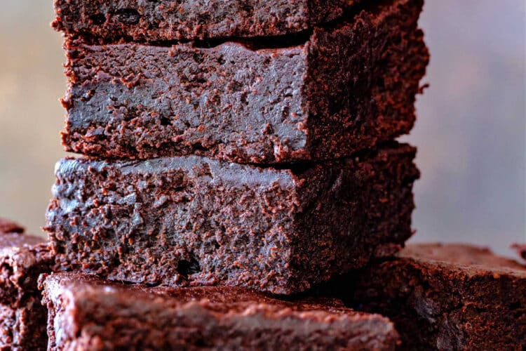 A stack of gooey, fudgy brownies.