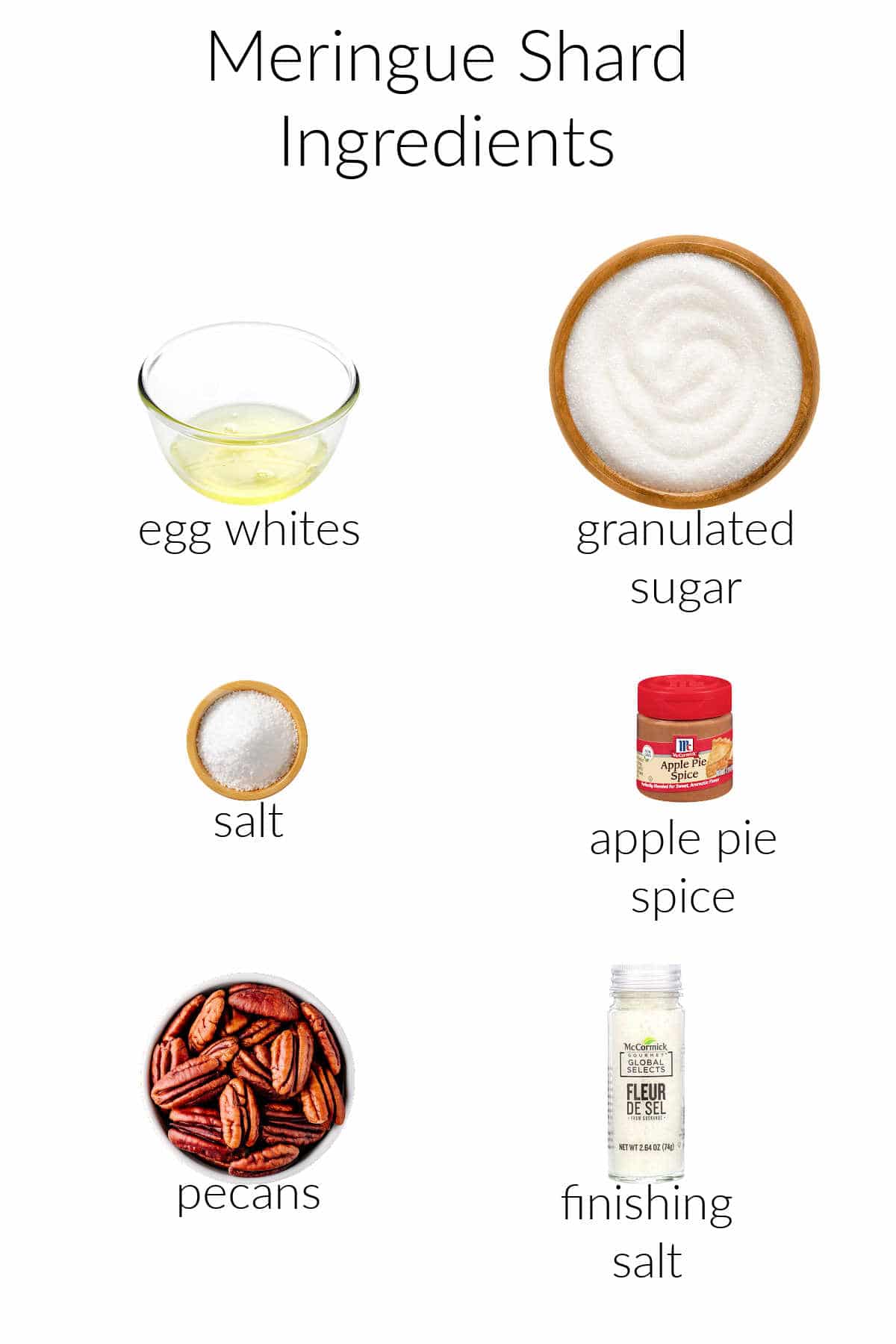 Ingredients for making meringue shards on a white background: egg white, sugar, salt, apple pie spice, pecans, and finishing salt.