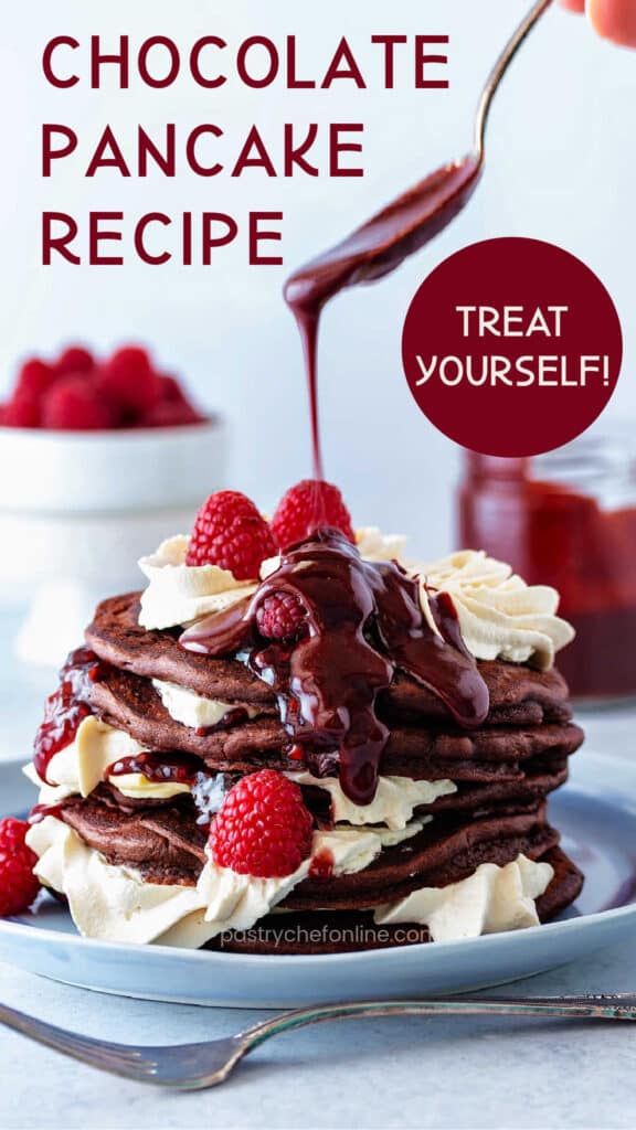 Pin image for chocolate pancakes with a plate of pancakes stacked on top of each other and garnished with swirls of whipped cream and raspberries with a chocolate syrup drizzle. Text reads, "Chocolate pancake recipe. Treat yourself.!"